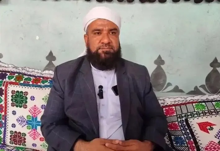 تصویری از پیکر مولوی شهید یوسف گرگیج در تجمع شبانه